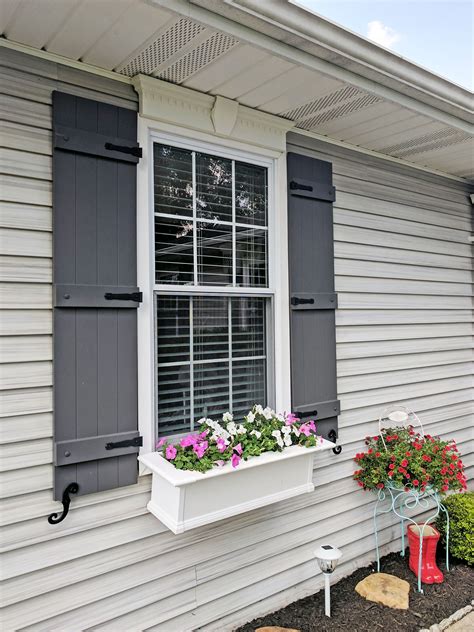 Vinyl board and batten shutters - True Fit 2-Pack 21.5-in W Paintable/Stainable Exterior Shutters. Model # CWB18X031UNC. Find My Store. for pricing and availability. Multiple Options Available. Color: Sojourn blue. Ekena Millwork. True Fit 2-Pack 10.75-in W Paintable/Stainable Z-bar Exterior Shutters. Model # TFP102BBF11X032HB.